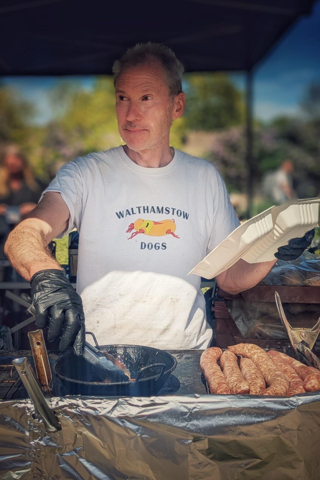 Chef preparing food at the Walthamstow Dogs stall